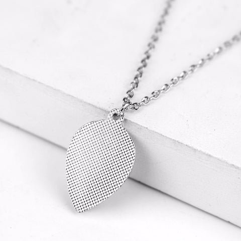 Collier Alien Logo